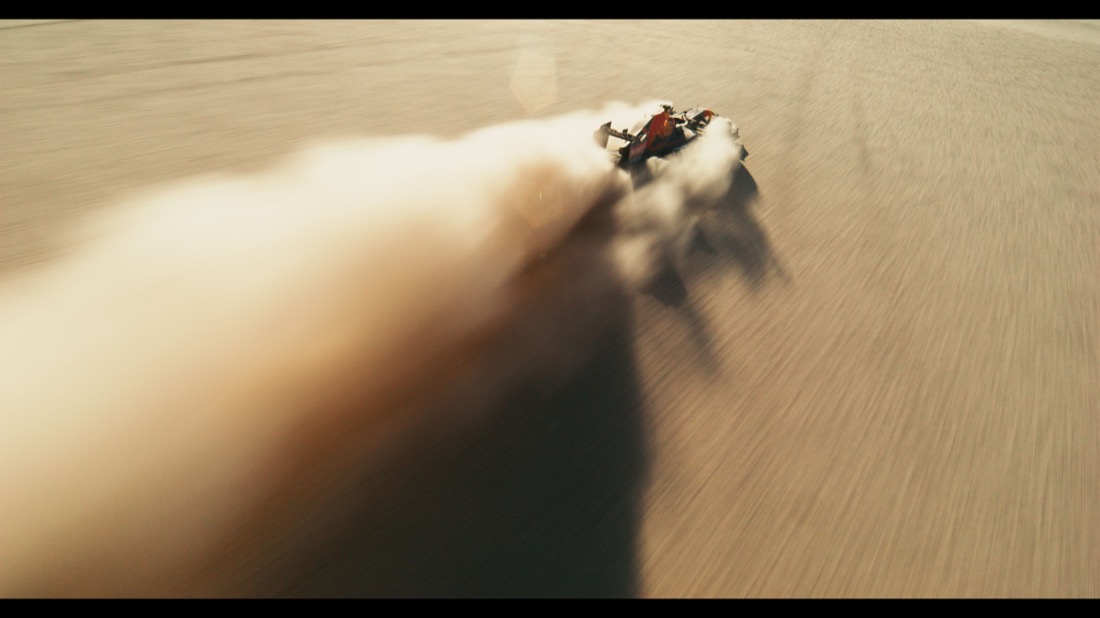 A blurry shot of a car driving on a road