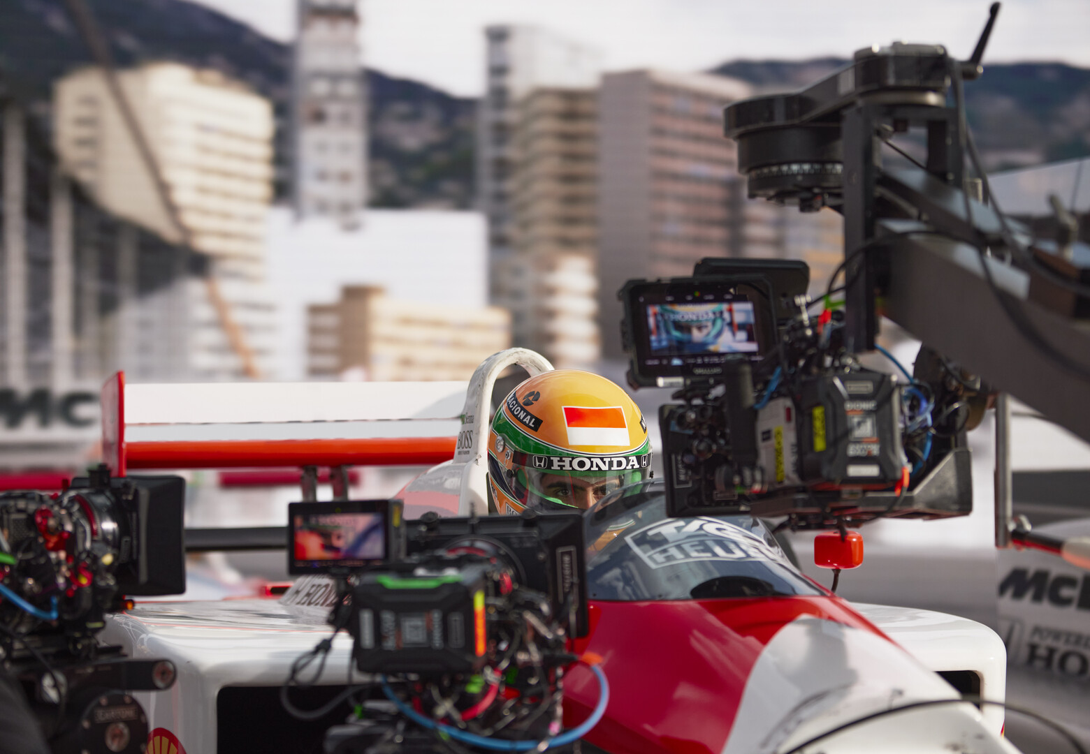 A camera pointed at a driver in a formula 1 car