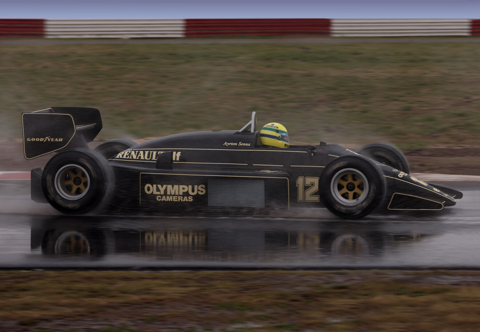 side view of a formula 1 car on a track in the rain