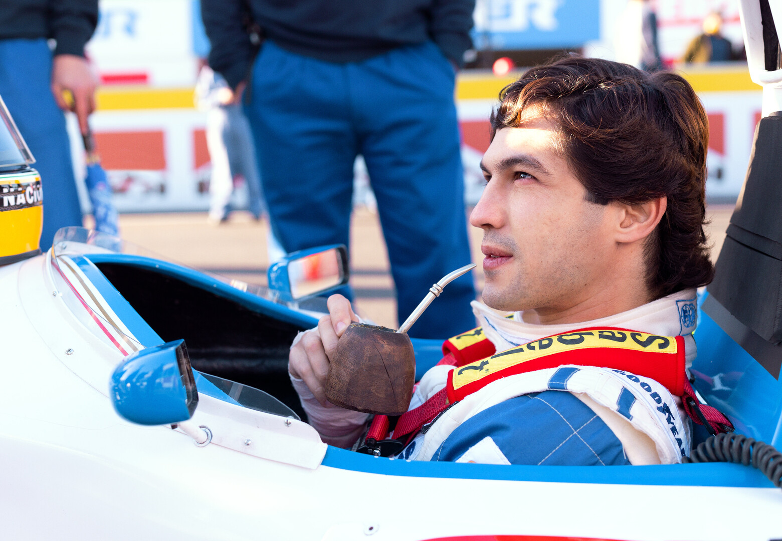 Gabriel Leone in a formula 1 drinking yerba mate