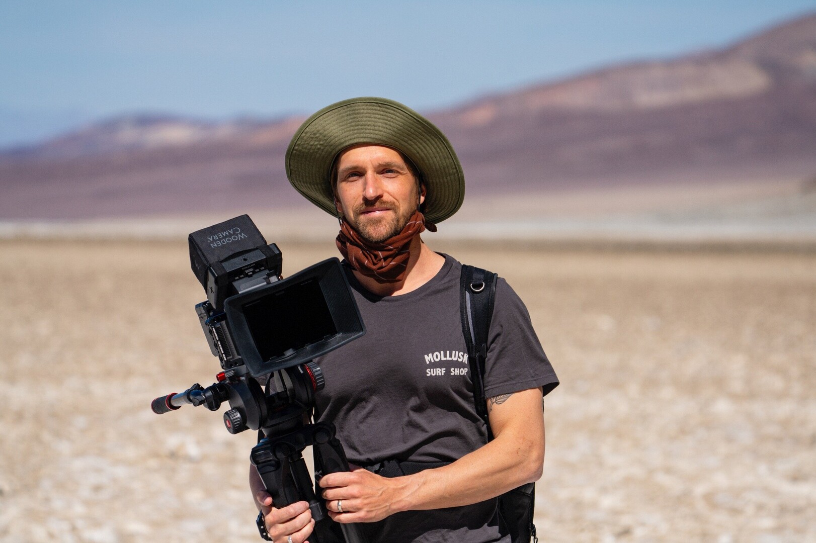 Phillip Mansfield holding RED camera on a tripod