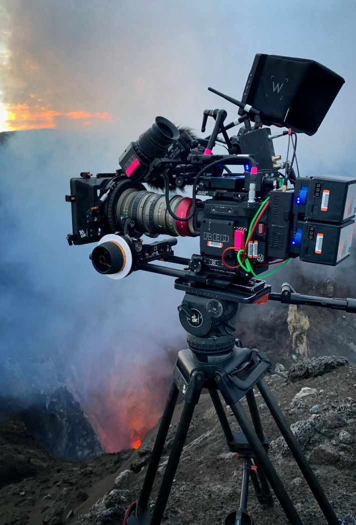 Camera tripod on volcano's edge