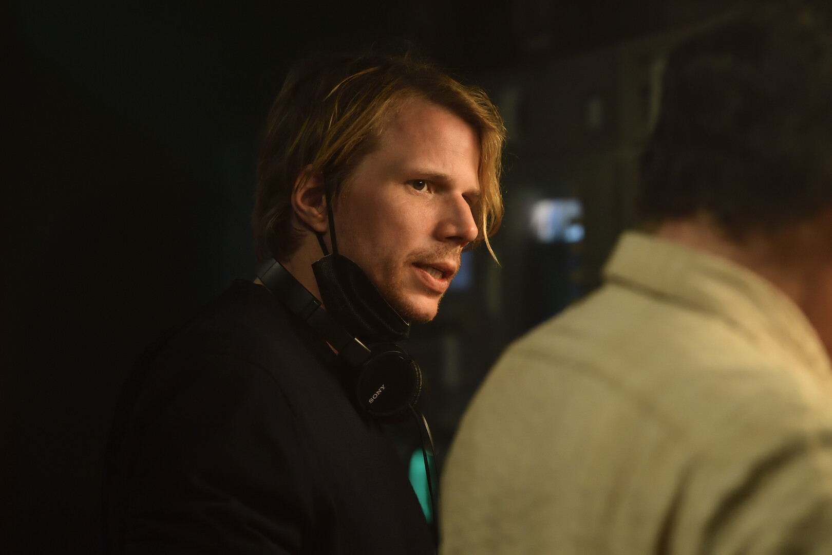 Tim Fehlbaum with headphones around his neck