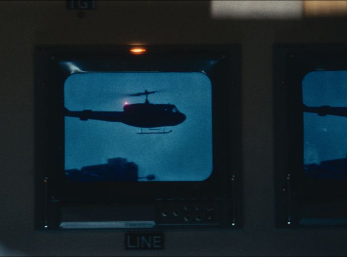 Television screen showing a helicopter